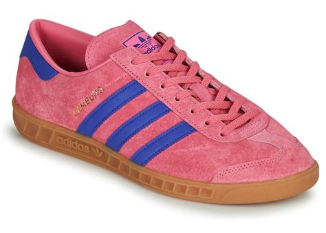 navy blue and pink sambas.